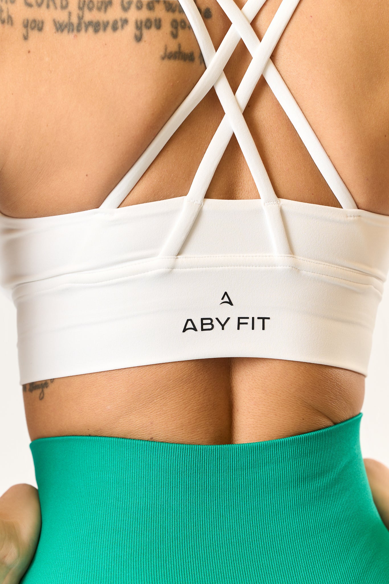 SOFT BY LUXURY Biały gorset z czarnym logo